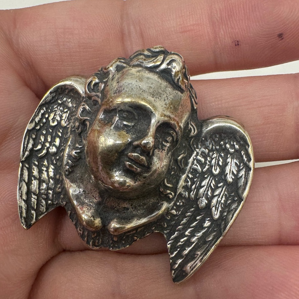 Rebecca Collins Sterling silver cherub pin